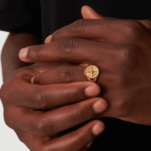 compass signet ring gold close